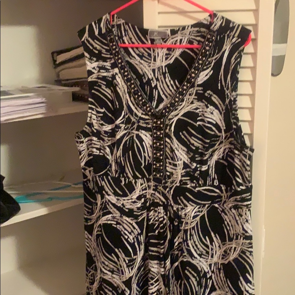 Black sleeveless dress with tan and cream swirls